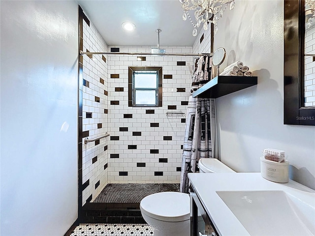 11525 Country Oaks Dr, Tampa, FL 33618 - full bath featuring toilet, a stall shower, recessed lighting, vanity, and tile patterned flooring
