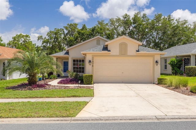 11078 Heathrow Ave, Spring Hill, FL 34609 - single story home with stucco siding, an attached garage, and concrete driveway