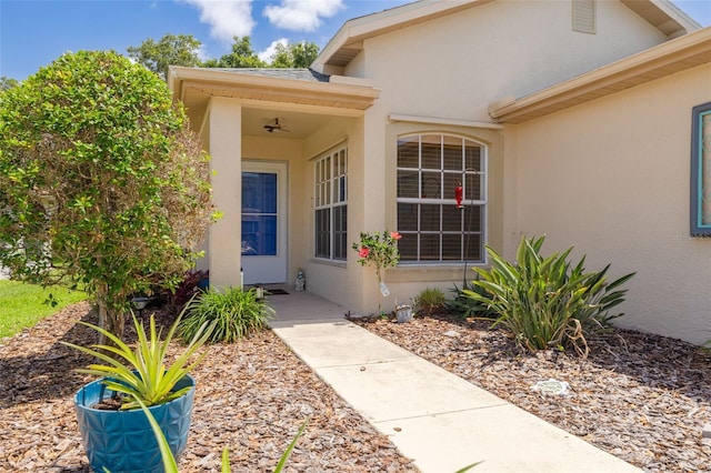 11078 Heathrow Ave, Spring Hill, FL 34609 - view of exterior entry featuring stucco siding