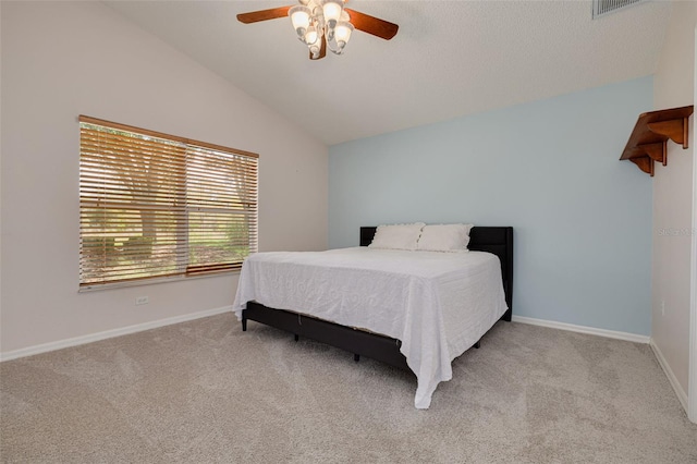 11078 Heathrow Ave, Spring Hill, FL 34609 - carpeted bedroom with lofted ceiling, ceiling fan, and baseboards
