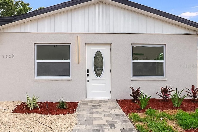 7620 N 74th St, Pinellas Park, FL 33781 - doorway to property with stucco siding