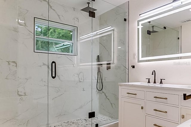 7620 N 74th St, Pinellas Park, FL 33781 - bathroom with a marble finish shower and vanity