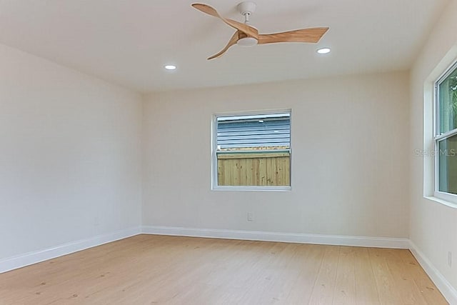 7620 N 74th St, Pinellas Park, FL 33781 - unfurnished room with light wood-style floors, a ceiling fan, recessed lighting, and baseboards