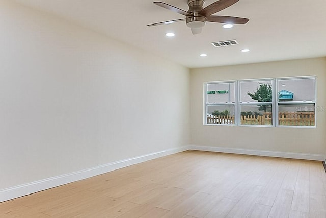 7620 N 74th St, Pinellas Park, FL 33781 - empty room featuring ceiling fan, light wood-style floors, baseboards, and recessed lighting
