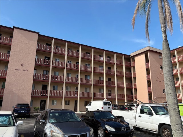 4137 Lake Bayshore Dr Unit C505, Bradenton, FL 34205 - view of apartment building / complex with uncovered parking