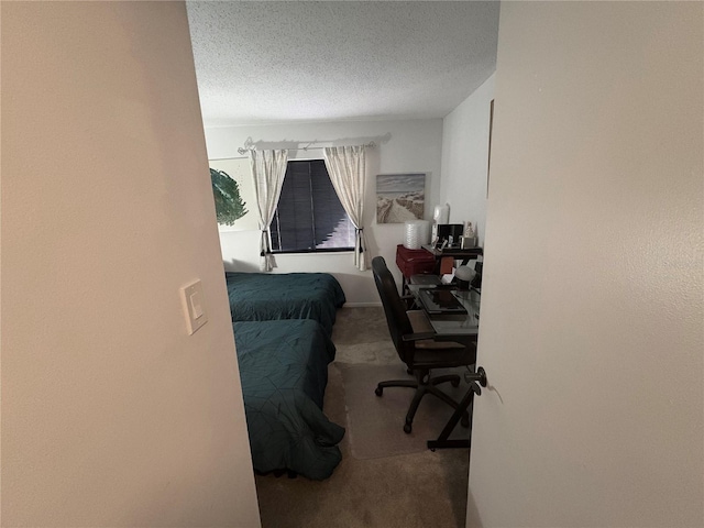 4137 Lake Bayshore Dr Unit C505, Bradenton, FL 34205 - carpeted bedroom featuring a textured ceiling and an office area