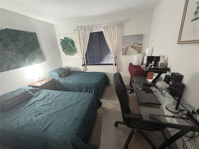 4137 Lake Bayshore Dr Unit C505, Bradenton, FL 34205 - carpeted bedroom featuring a textured ceiling