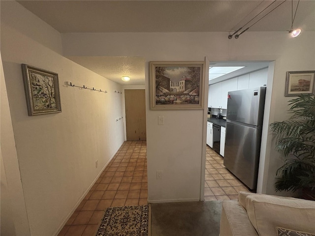 4137 Lake Bayshore Dr Unit C505, Bradenton, FL 34205 - corridor with light tile patterned floors