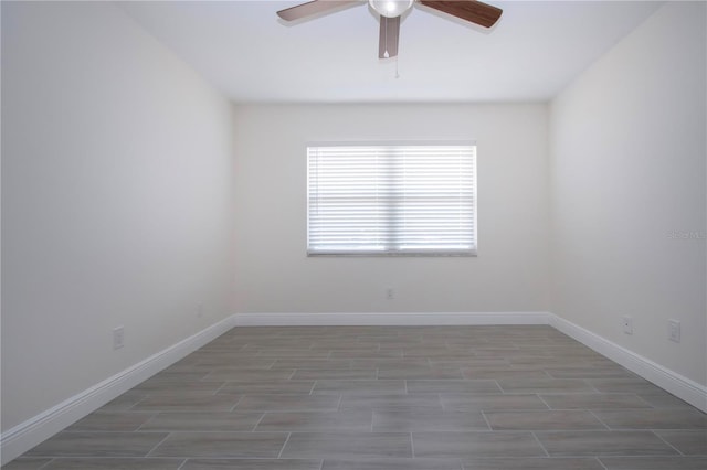 1906 Canterbury Ln Unit 20, Sun City Center, FL 33573 - unfurnished room featuring a ceiling fan, baseboards, and wood finished floors