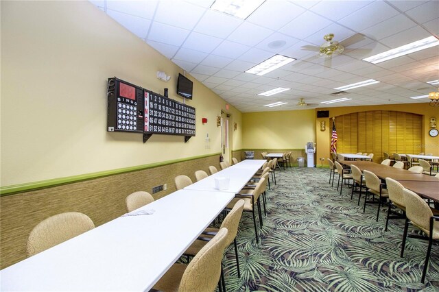 1906 Canterbury Ln Unit 20, Sun City Center, FL 33573 - dining space featuring carpet flooring, wainscoting, and ceiling fan