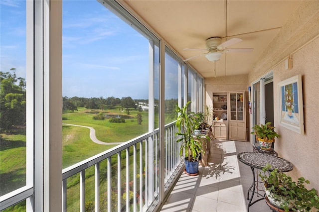 9461 Harbor Greens Way Unit 502, Seminole, FL 33776 - sunroom featuring ceiling fan