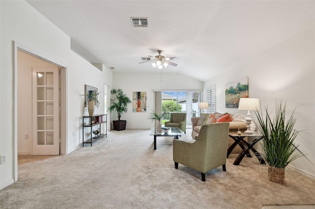19409 Weymouth Dr, Land O Lakes, FL 34638 - living area featuring carpet, lofted ceiling, a ceiling fan, and baseboards