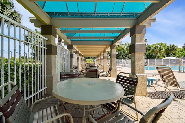 19409 Weymouth Dr, Land O Lakes, FL 34638 - view of patio / terrace with a community pool