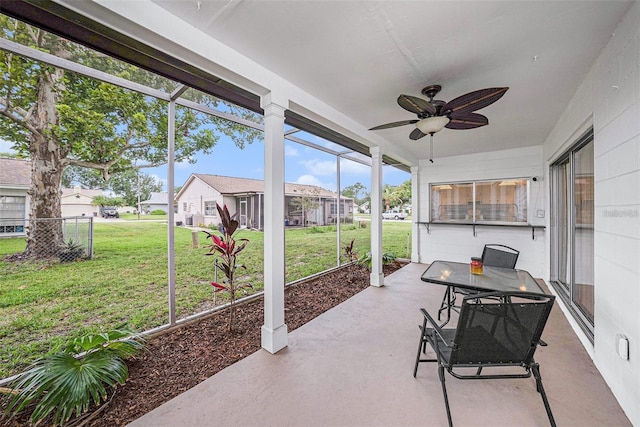 13013 Sawmill Way, Hudson, FL 34667 - sunroom with a ceiling fan and a residential view
