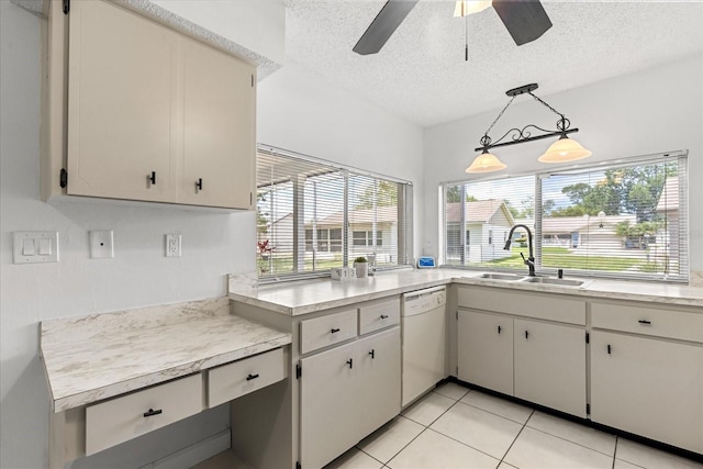 13013 Sawmill Way, Hudson, FL 34667 - kitchen with a sink, dishwasher, a textured ceiling, light countertops, and a ceiling fan