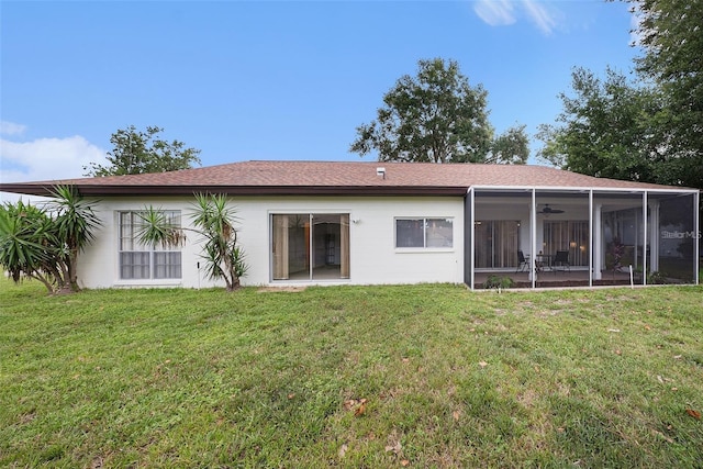 13013 Sawmill Way, Hudson, FL 34667 - back of property with a yard, a sunroom, and ceiling fan