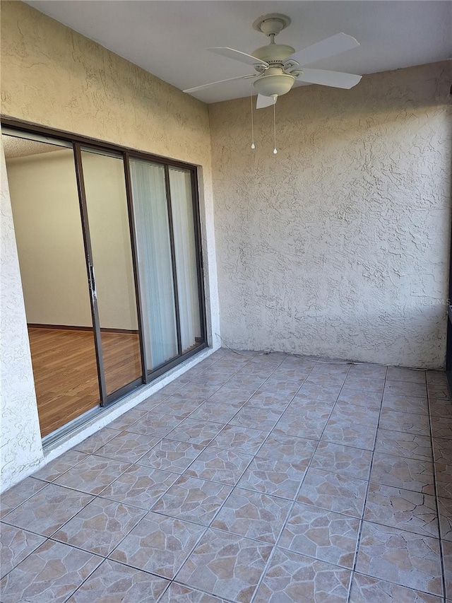 3536 Countrybrook Ln Unit 13, Palm Harbor, FL 34684 - view of patio / terrace with ceiling fan
