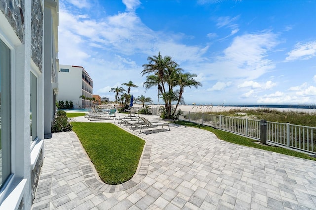 4950 Gulf Blvd Unit 404, St Pete Beach, FL 33706 - view of patio / terrace with a water view
