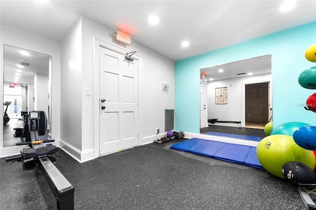 4950 Gulf Blvd Unit 404, St Pete Beach, FL 33706 - workout room featuring recessed lighting and baseboards
