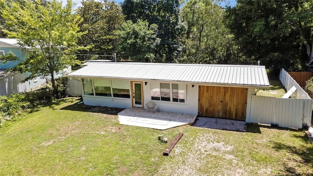 8944 W White Dogwood Dr, Homosassa, FL 34448 - rear view of property featuring metal roof