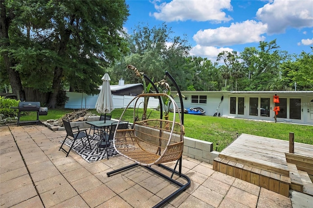 8944 W White Dogwood Dr, Homosassa, FL 34448 - view of patio featuring outdoor dining area and grilling area