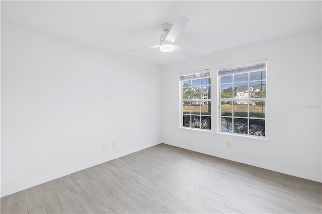 3300 Haviland Ct Unit 103, Palm Harbor, FL 34684 - spare room with wood finished floors and ceiling fan