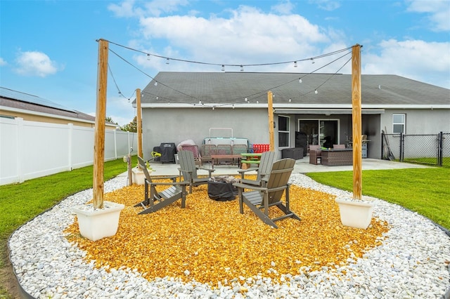 2053 Charleston Ln, Bartow, FL 33830 - rear view of house with a patio, a gate, and stucco siding