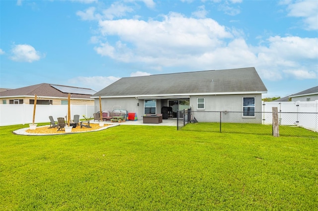 2053 Charleston Ln, Bartow, FL 33830 - rear view of property featuring an outdoor fire pit, a patio area, stucco siding, and a jacuzzi