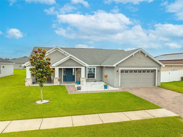 2053 Charleston Ln, Bartow, FL 33830 - view of front facade featuring a garage, driveway, and stucco siding