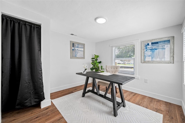 4626 8th Ave S, Saint Petersburg, FL 33711 - office space with baseboards and wood finished floors