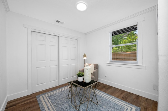 4626 8th Ave S, Saint Petersburg, FL 33711 - living area with baseboards and dark wood-type flooring
