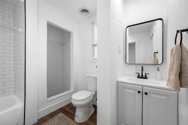 4626 8th Ave S, Saint Petersburg, FL 33711 - full bathroom featuring wood finished floors, toilet, and vanity
