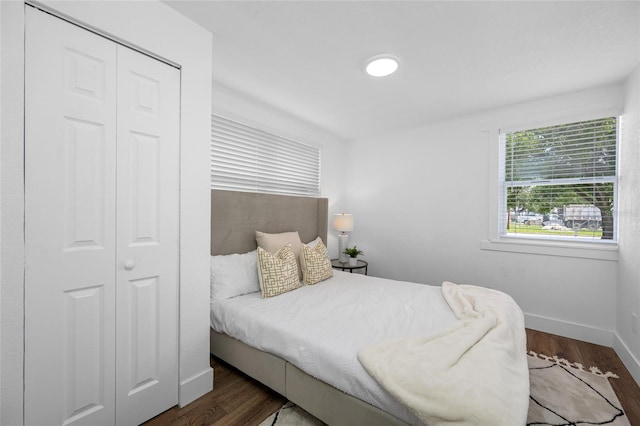 4626 8th Ave S, Saint Petersburg, FL 33711 - bedroom with baseboards, wood finished floors, and a closet