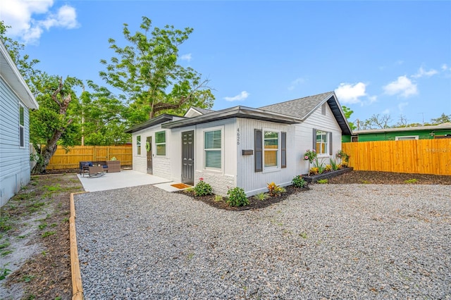 4626 8th Ave S, Saint Petersburg, FL 33711 - view of side of property featuring a patio and a fenced backyard