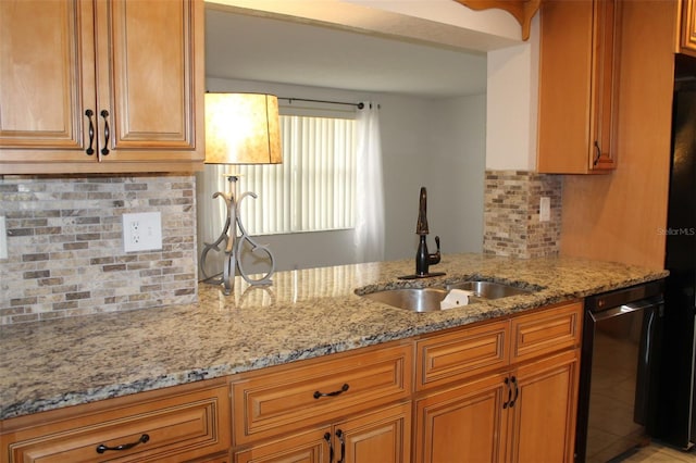 9705 45th Way N, Pinellas Park, FL 33782 - kitchen with black dishwasher, a sink, light stone countertops, and tasteful backsplash