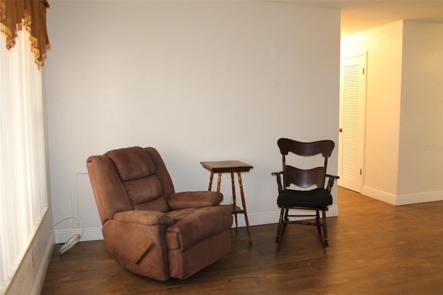 9705 45th Way N, Pinellas Park, FL 33782 - sitting room with wood finished floors and baseboards