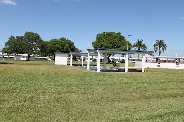 9705 45th Way N, Pinellas Park, FL 33782 - dock featuring a lawn