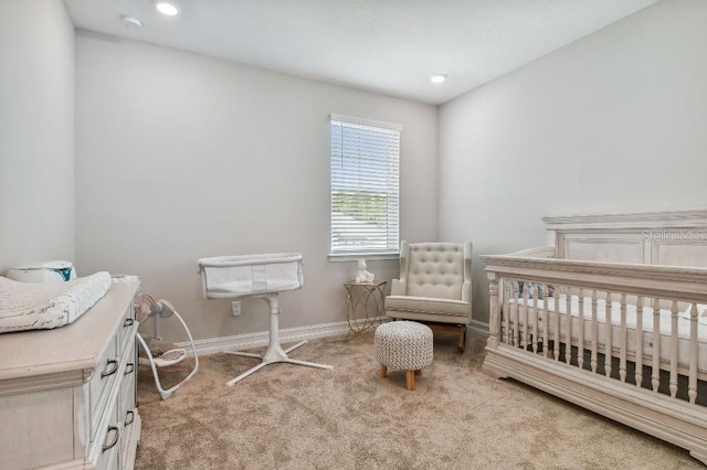 6129 Marsh Trail Dr, Odessa, FL 33556 - carpeted bedroom featuring a crib, baseboards, and recessed lighting