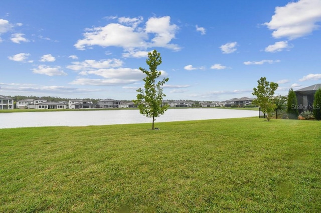 6129 Marsh Trail Dr, Odessa, FL 33556 - view of green lawn with a residential view and a water view