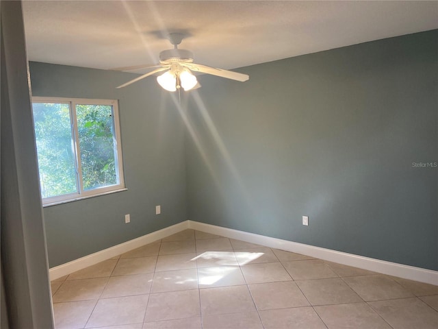 2160 Corbin Pl Unit C, Palm Harbor, FL 34683 - empty room featuring ceiling fan and light tile patterned flooring