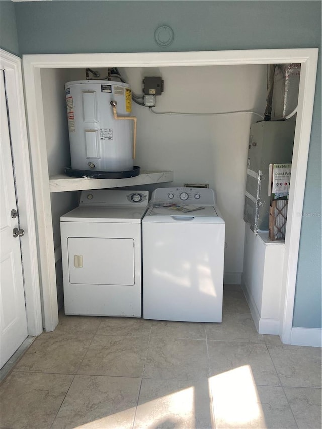 2160 Corbin Pl Unit C, Palm Harbor, FL 34683 - washroom with water heater and washing machine and dryer