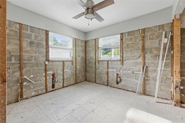 1720 Bayou Grande Blvd NE, Saint Petersburg, FL 33703 - spare room with healthy amount of natural light and a ceiling fan