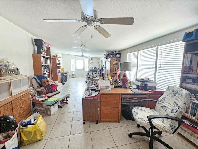 4352 Joy Dr, Land O Lakes, FL 34638 - office with ceiling fan, light tile patterned floors, and a textured ceiling
