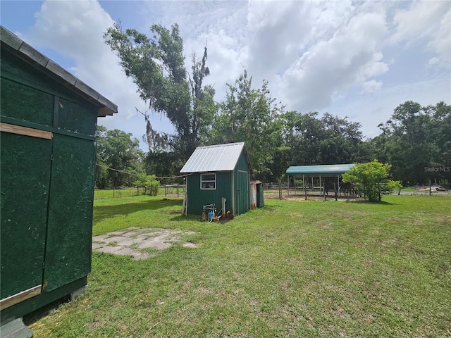 4352 Joy Dr, Land O Lakes, FL 34638 - view of yard with a storage shed