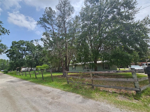 4352 Joy Dr, Land O Lakes, FL 34638 - view of front of home featuring a fenced front yard