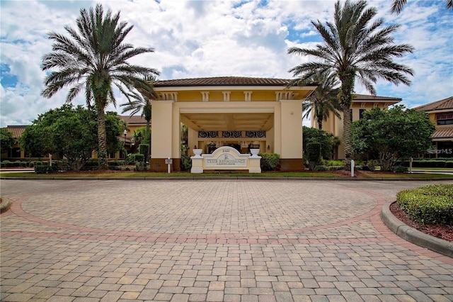 1510 Flamingo Ln, Sun City Center, FL 33573 - view of property with curved driveway