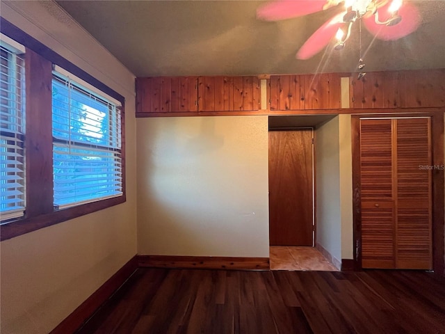 9907 Maggie St, Gibsonton, FL 33534 - unfurnished bedroom featuring light wood-type flooring, baseboards, ceiling fan, and a closet