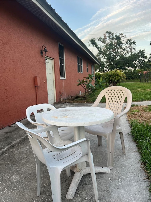 9907 Maggie St, Gibsonton, FL 33534 - view of patio with outdoor dining space