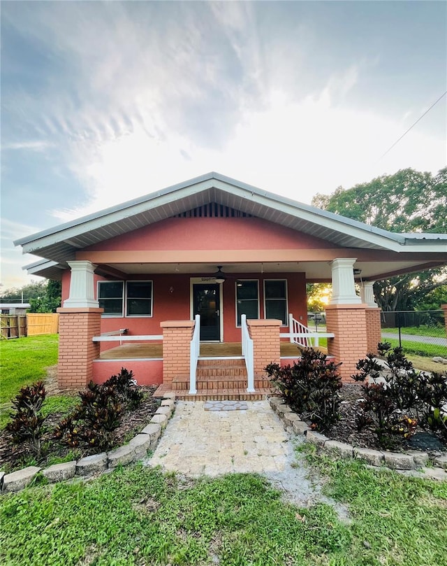 9907 Maggie St, Gibsonton, FL 33534 - view of front facade featuring covered porch