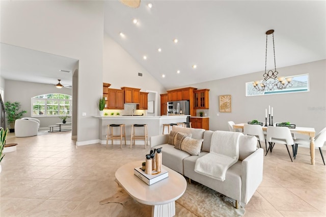 4306 Barracuda Dr, Bradenton, FL 34208 - living area with high vaulted ceiling, a chandelier, ceiling fan, recessed lighting, and light tile patterned flooring